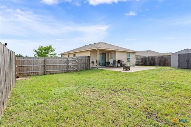 216 Pullman Place Blvd, Temple, TX 76502 - rear view of house featuring a patio area, a shed, and an outbuilding