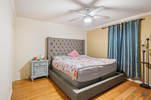 216 Pullman Place Blvd, Temple, TX 76502 - bedroom featuring wood finished floors, ornamental molding, baseboards, and a ceiling fan