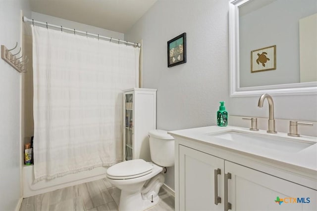 216 Pullman Place Blvd, Temple, TX 76502 - full bathroom featuring toilet, curtained shower, vanity, and baseboards