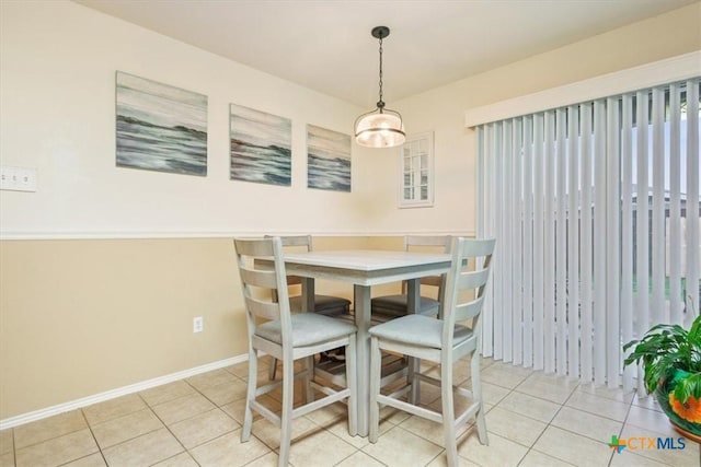 216 Pullman Place Blvd, Temple, TX 76502 - tiled dining room featuring baseboards