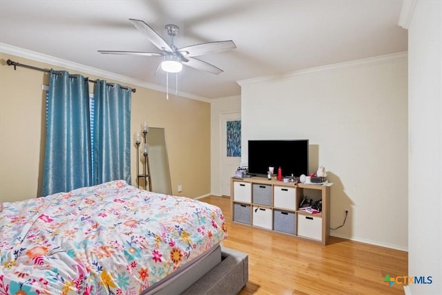 216 Pullman Place Blvd, Temple, TX 76502 - bedroom with crown molding, wood finished floors, baseboards, and ceiling fan