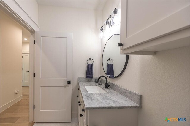 150 Panorama Dr, Wimberley, TX 78676 - bathroom with vanity and wood finished floors