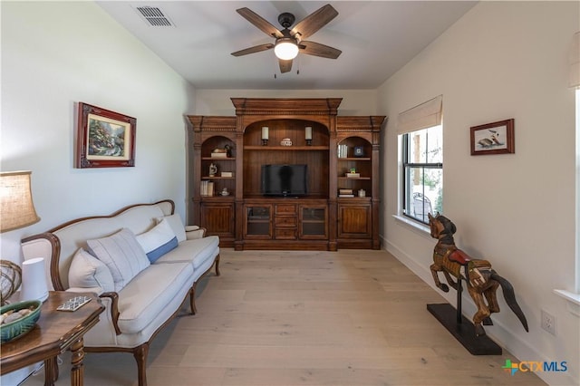 150 Panorama Dr, Wimberley, TX 78676 - living area with a ceiling fan and light wood-style flooring