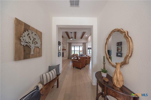 150 Panorama Dr, Wimberley, TX 78676 - hall featuring light wood-style flooring and beamed ceiling