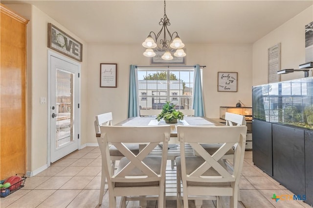 846 Thomas St, Copperas Cove, TX 76522 - dining area featuring light tile patterned floors and a chandelier