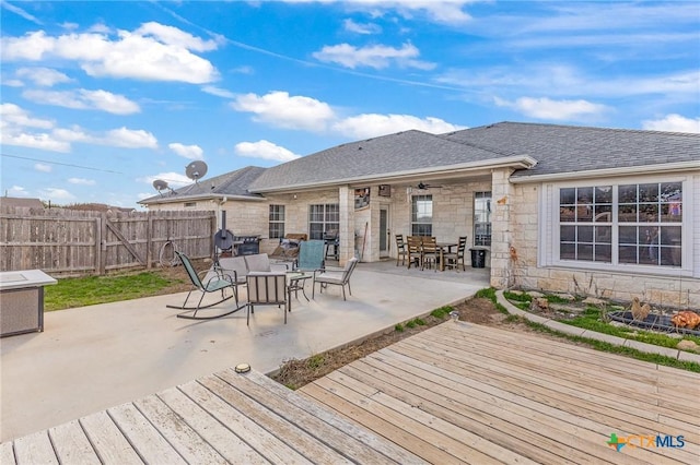 846 Thomas St, Copperas Cove, TX 76522 - wooden terrace with outdoor dining area, ceiling fan, and a patio area