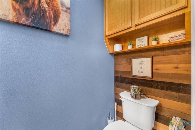 846 Thomas St, Copperas Cove, TX 76522 - bathroom with wood walls and a textured wall