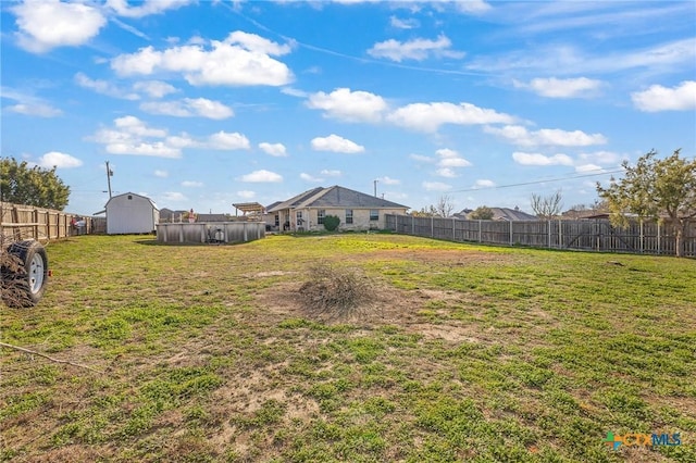 846 Thomas St, Copperas Cove, TX 76522 - fenced backyard with a storage unit
