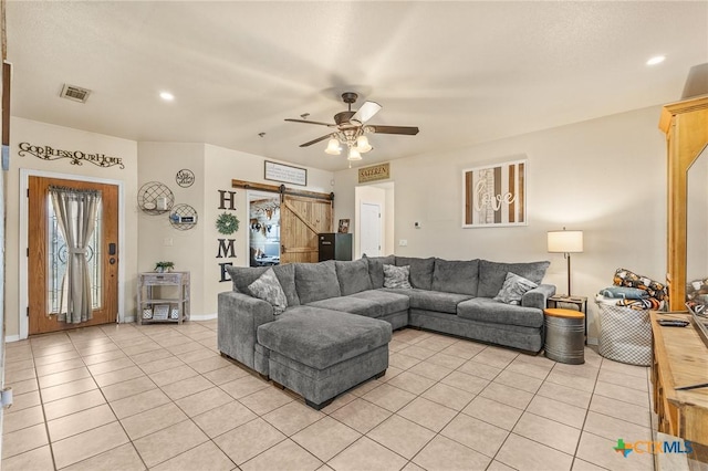846 Thomas St, Copperas Cove, TX 76522 - living area featuring a barn door, light tile patterned flooring, ceiling fan, and recessed lighting