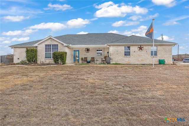 846 Thomas St, Copperas Cove, TX 76522 - view of front of house featuring stone siding, a shingled roof, and a front lawn
