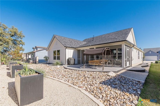 back of property with a patio area