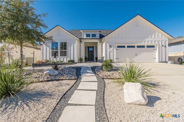 117 Cruising Oak St, San Marcos, TX 78666 - modern inspired farmhouse with board and batten siding, driveway, and a garage