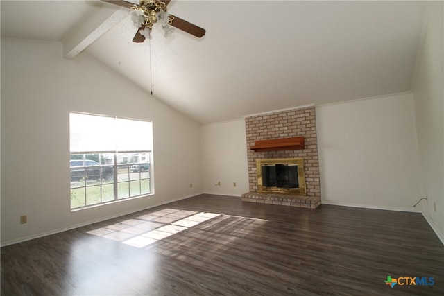 unfurnished living room with dark hardwood / wood-style floors, lofted ceiling with beams, a fireplace, and ceiling fan