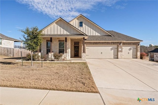 view of front of property featuring a porch and a garage