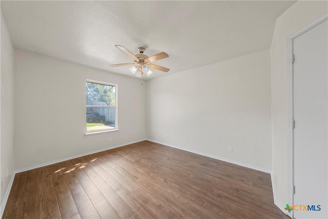 4701 Ridgehaven Dr, Killeen, TX 76543 - spare room with ceiling fan, wood finished floors, and baseboards
