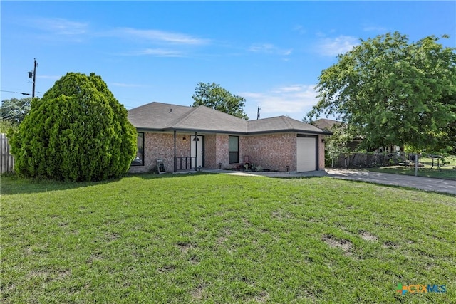 4701 Ridgehaven Dr, Killeen, TX 76543 - ranch-style house with driveway, a garage, and brick siding