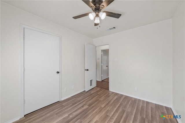 4701 Ridgehaven Dr, Killeen, TX 76543 - unfurnished bedroom featuring light wood finished floors, baseboards, and ceiling fan