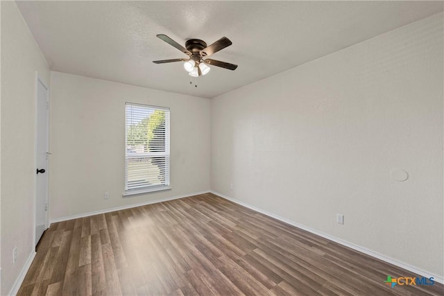 4701 Ridgehaven Dr, Killeen, TX 76543 - empty room featuring wood finished floors, a ceiling fan, and baseboards