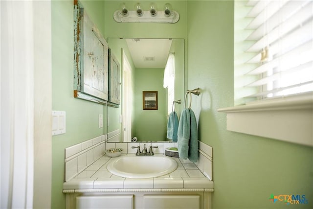 24135 State Highway 172, Port Lavaca, TX 77979 - bathroom featuring vanity and healthy amount of natural light