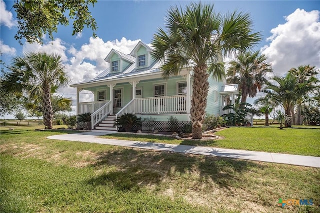 24135 State Highway 172, Port Lavaca, TX 77979 - view of front of property featuring a porch and stairway