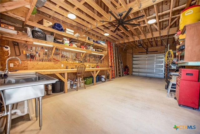 24135 State Highway 172, Port Lavaca, TX 77979 - garage featuring a workshop area and ceiling fan