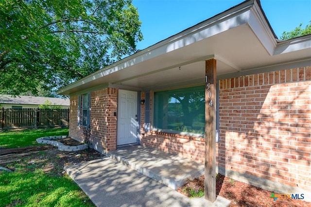 1504 Phyllis Dr, Copperas Cove, TX 76522 - view of exterior entry featuring brick siding