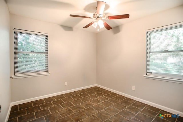 1504 Phyllis Dr, Copperas Cove, TX 76522 - spare room featuring plenty of natural light, a ceiling fan, and baseboards
