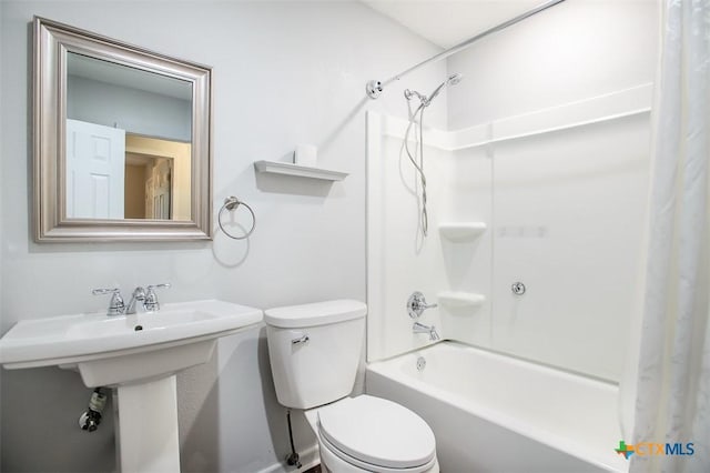 1504 Phyllis Dr, Copperas Cove, TX 76522 - bathroom featuring shower / tub combo with curtain and toilet