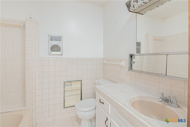 bathroom featuring tile walls, tile patterned flooring, vanity, and toilet