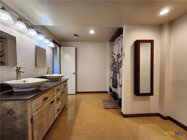 bathroom featuring vanity