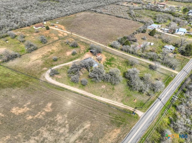 birds eye view of property featuring a rural view