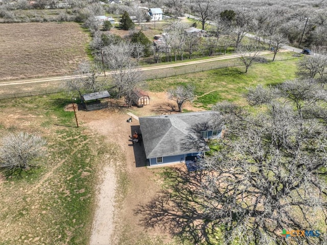 birds eye view of property featuring a rural view