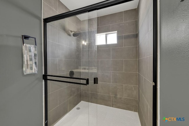 full bath featuring a stall shower