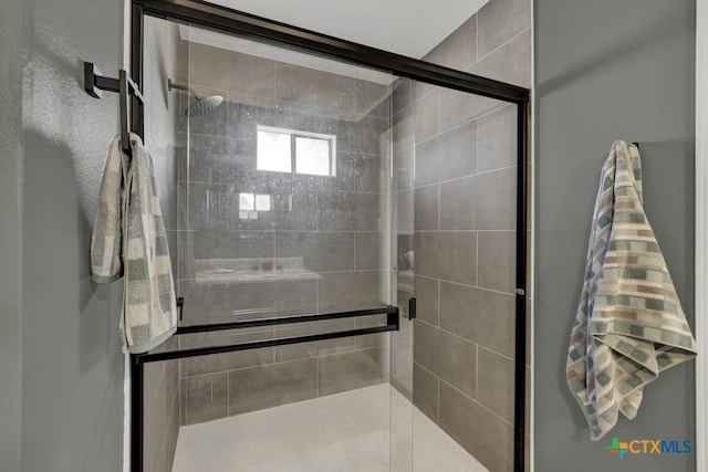 bathroom with a stall shower