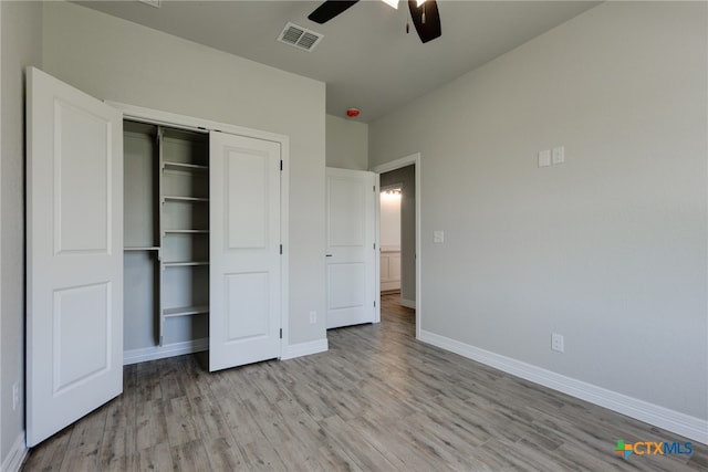 unfurnished bedroom featuring a closet, ceiling fan, and light hardwood / wood-style floors