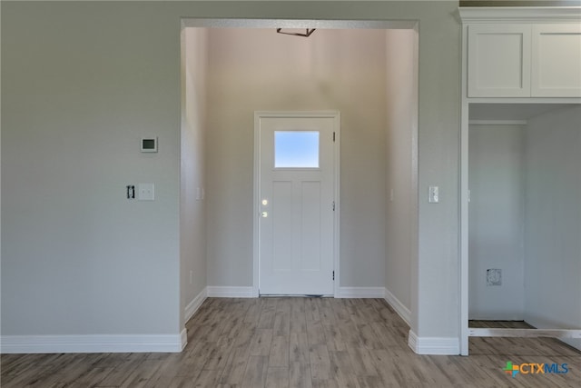 entryway with light wood-type flooring