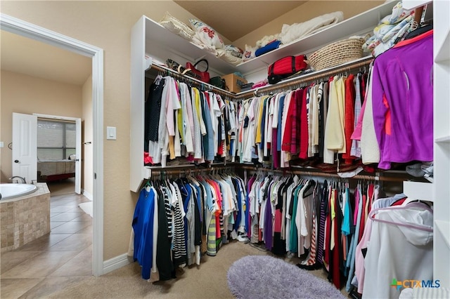 walk in closet featuring tile patterned floors