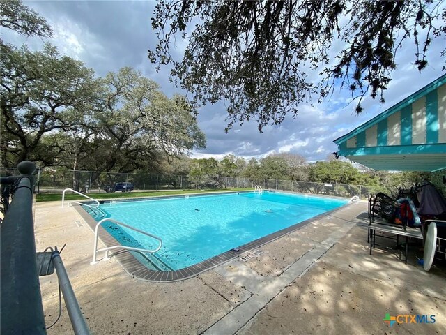 1637 Bob White Dr, Spring Branch, TX 78070 - community pool featuring fence and a patio