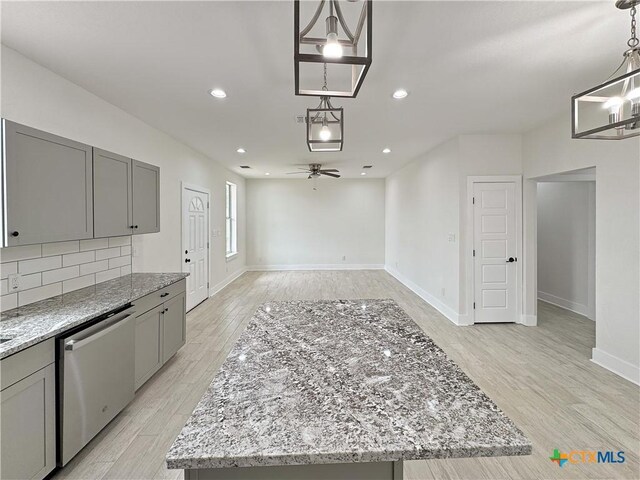 1637 Bob White Dr, Spring Branch, TX 78070 - garage with ceiling fan, baseboards, and recessed lighting