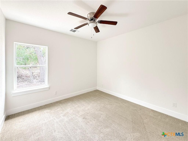 1637 Bob White Dr, Spring Branch, TX 78070 - unfurnished room featuring carpet flooring, baseboards, and a ceiling fan