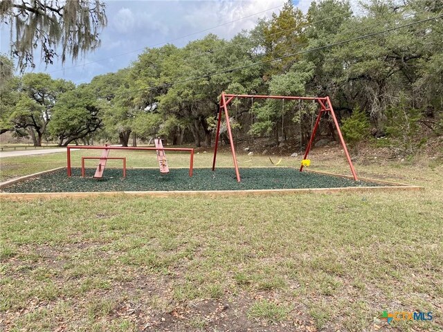 1637 Bob White Dr, Spring Branch, TX 78070 - view of jungle gym with a lawn