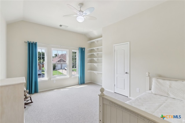 19303 Anna Kate Ct, Pflugerville, TX 78660 - bedroom with vaulted ceiling, carpet flooring, a ceiling fan, and baseboards