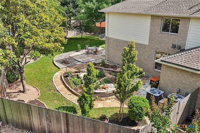 19303 Anna Kate Ct, Pflugerville, TX 78660 - view of yard featuring a patio and central air condition unit