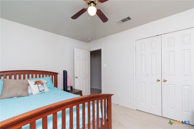 2409 Eppinette Dr, Killeen, TX 76542 - bedroom featuring light colored carpet, ceiling fan, and a closet