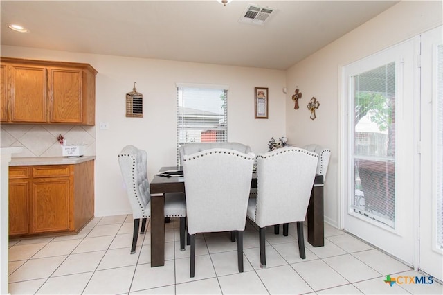 2409 Eppinette Dr, Killeen, TX 76542 - dining room featuring light tile patterned floors and recessed lighting