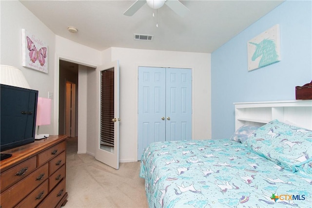 2409 Eppinette Dr, Killeen, TX 76542 - bedroom featuring light carpet, a closet, ceiling fan, and baseboards