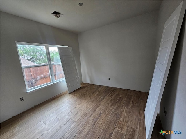 1420 Canyon Bnd, Canyon Lake, TX 78133 - empty room featuring wood finished floors