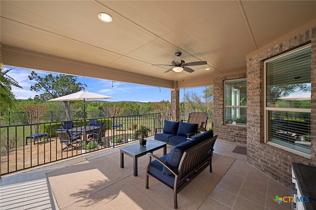 182 Emma Loop, Austin, TX 78737 - view of patio with an outdoor living space, fence, and ceiling fan
