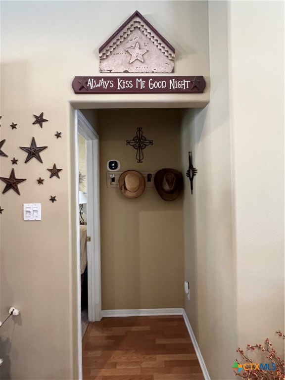 hallway featuring hardwood / wood-style floors