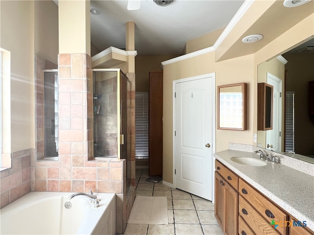 bathroom featuring vanity, shower with separate bathtub, and tile patterned floors